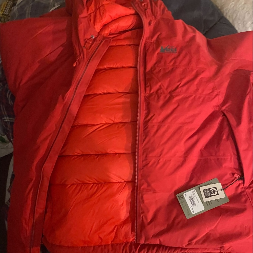 Brand new never worn size XL red Rei jacket 259$ with tag still just asking 200$
